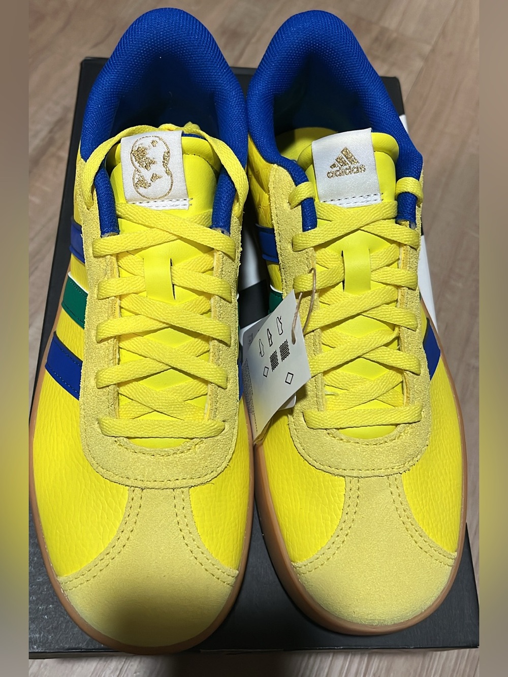adidas Kids Yellow Sneakers with Blue & Green Stripes